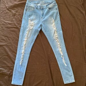 Women’s denim butt lifting jeans!  Size 7 worn once!